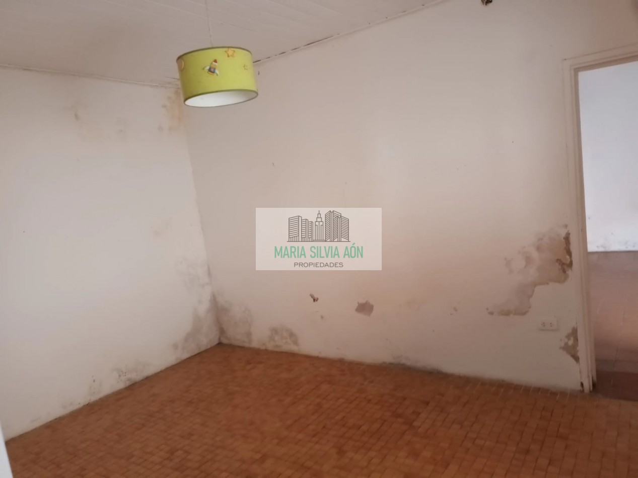 VENTA /PERMUTA CASA CON GALPON  EN CORONEL VIDAL CENTRO