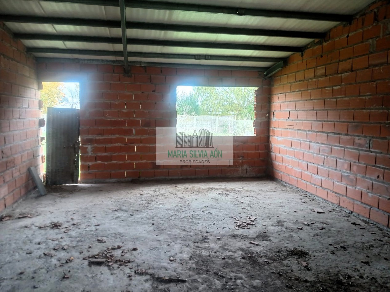 VENTA TERRENO CON VIVIENDA EN CONSTRUCCION 