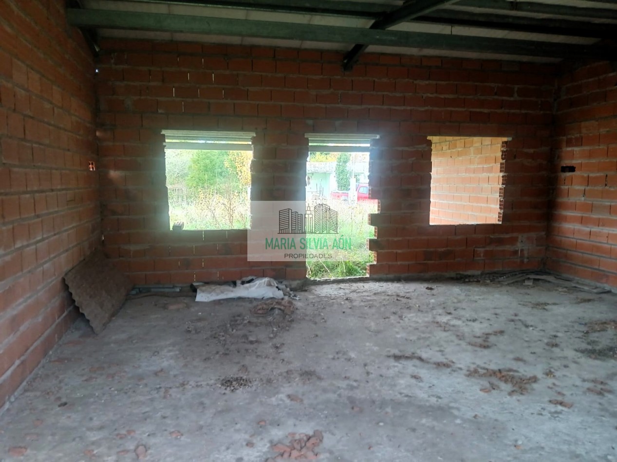 VENTA TERRENO CON VIVIENDA EN CONSTRUCCION 